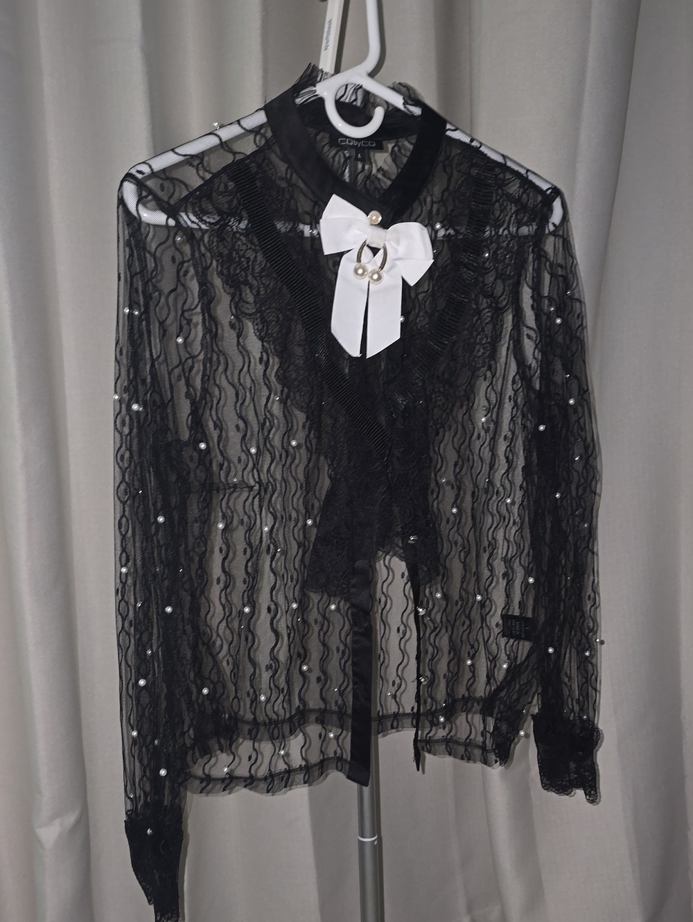 Black Sheer Lace Blouse with White Bow Accent